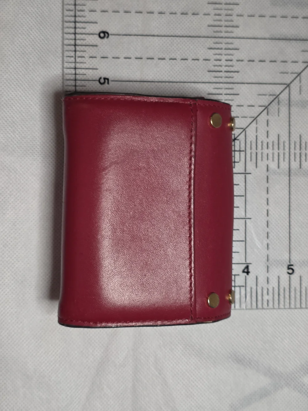 Michael Kors studded leather compact bifold wallet